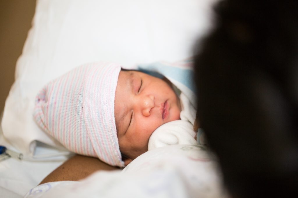 Holding my baby girl right before she met her siblings for the first time! - Lovemade Handmade